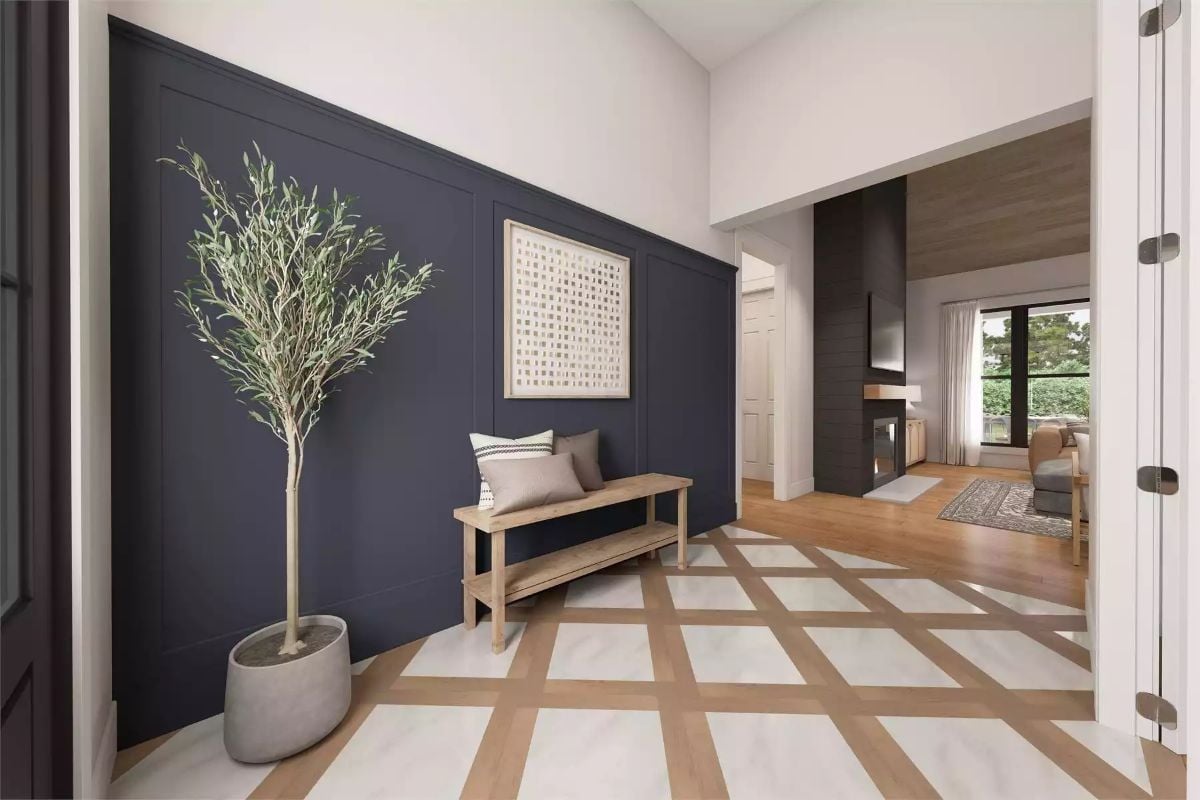 Navy Board-and-Batten Entryway with Geometric Tile Floor and Olive Tree