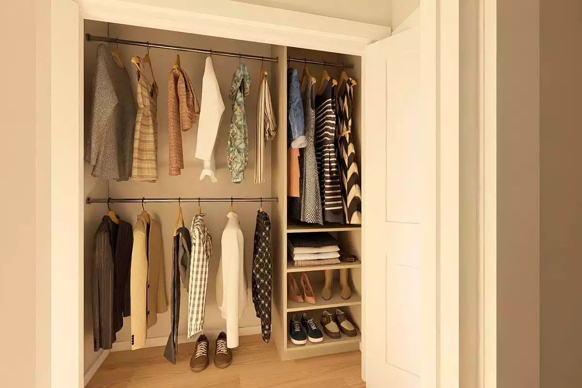 Double Hanging Rods and Built-In Shelving Keep This Reach-In Closet Genuinely Functional