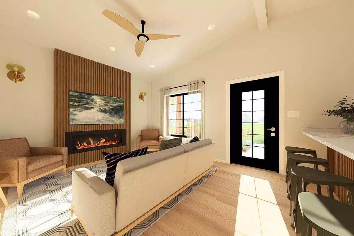 Fluted Wood Fireplace Wall Anchors an Open Living Space with Warm Restraint