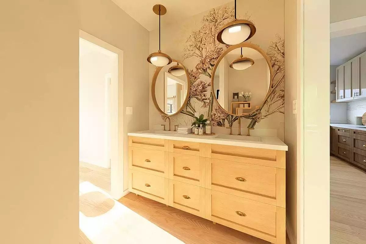 Gold Cup Pulls and Oval Mirrors Turn a Double Vanity Into Something Worth Keeping