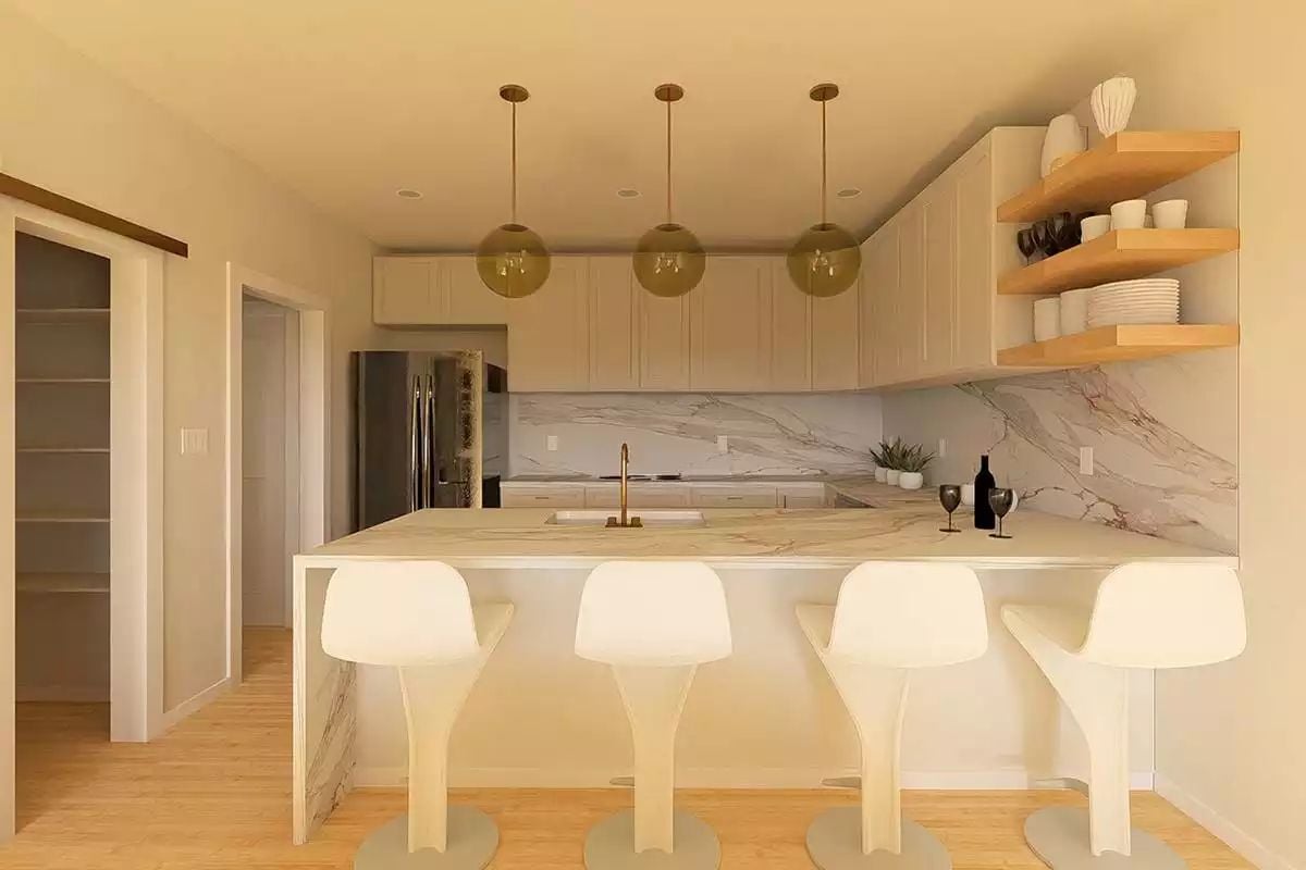 Gold Pendants and Marble Surfaces Set the Tone in This Kitchen