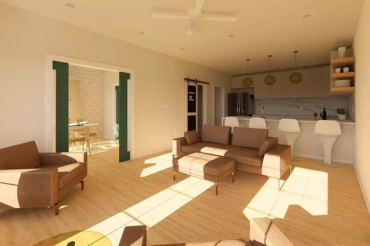 Barn Door, Brown Leather, and Borrowed Sunlight Make This Living Room Work