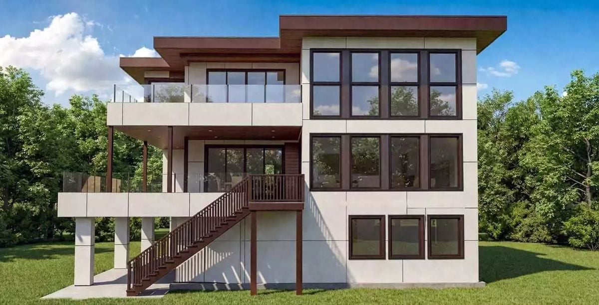 Three Levels of Glass and Wood Make a Strong Case for Sloped-Lot Building