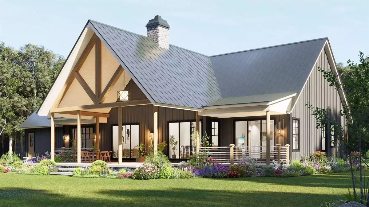 Exposed Timber Gable and Metal Roof Define This Farmhouse's Rear Elevation