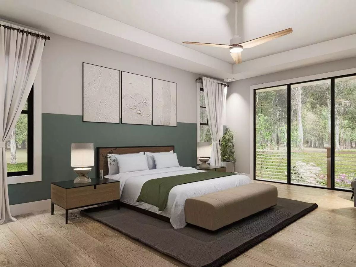 Sage Green Half-Wall and Sliding Glass Doors Bring the Outdoors Into This Primary Bedroom