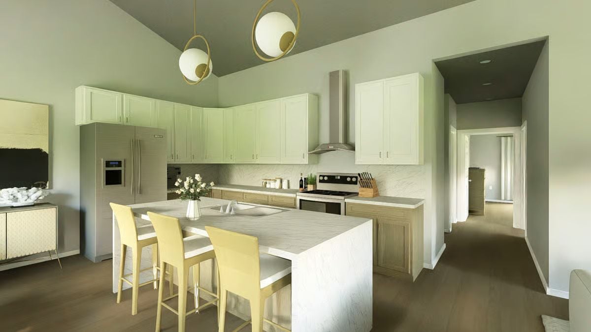 Gold Pendants and a Marble Island Anchor This Kitchen's Quiet Confidence