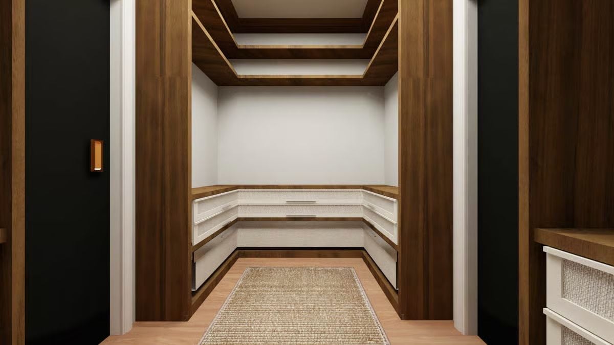 Walnut Millwork and Open Shelving Give This Walk-In Closet Real Structure