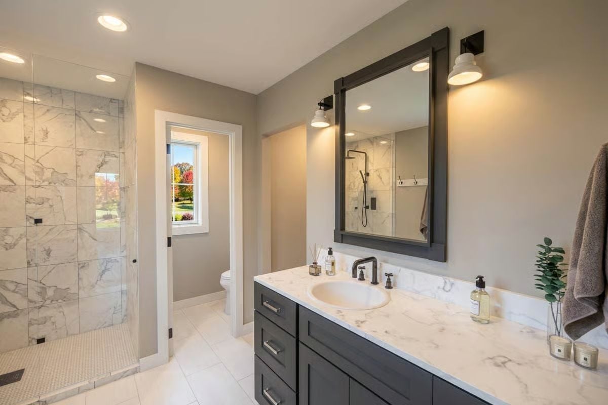 Marble Walls and a Walk-In Shower Make This Ensuite Hard to Rush Through