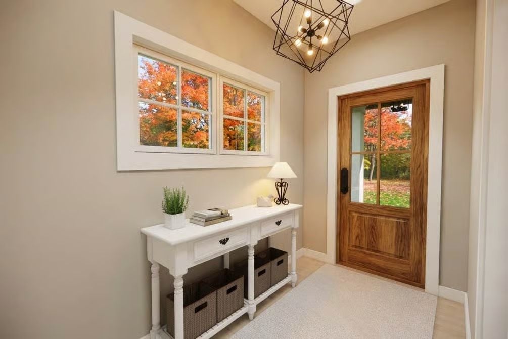 Warm Wood Entry Door Anchors a Fall-Ready Foyer