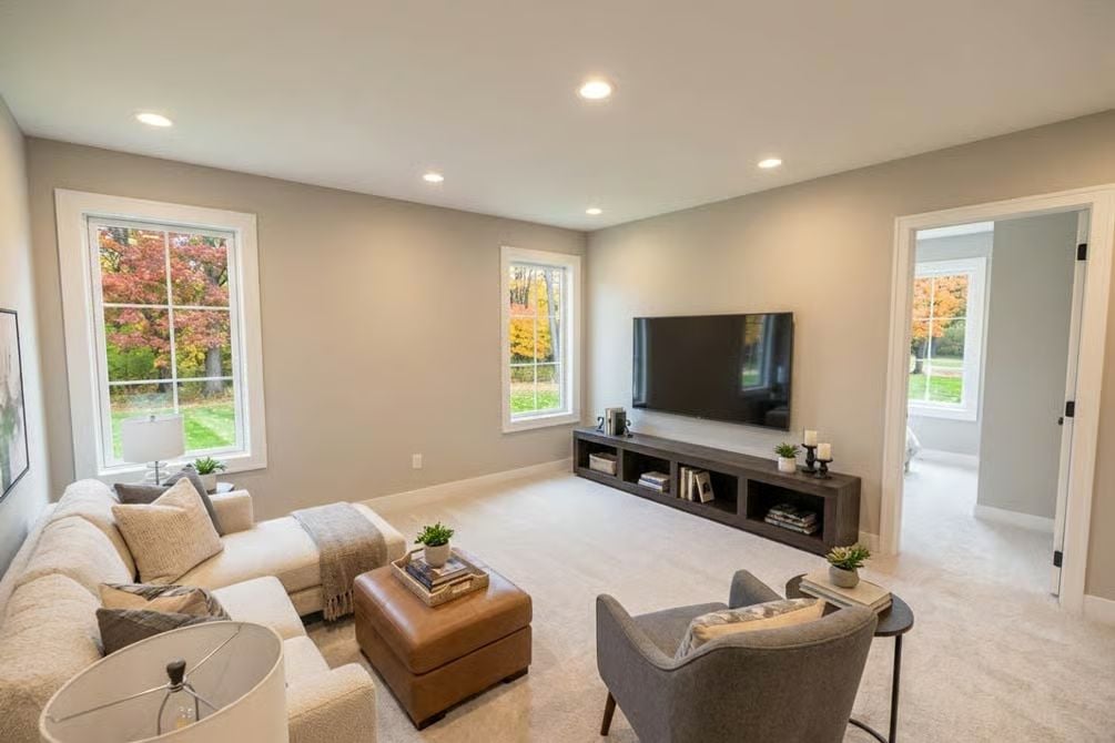 Greige Walls and Carpet Keep This Bonus Room Quietly Grounded
