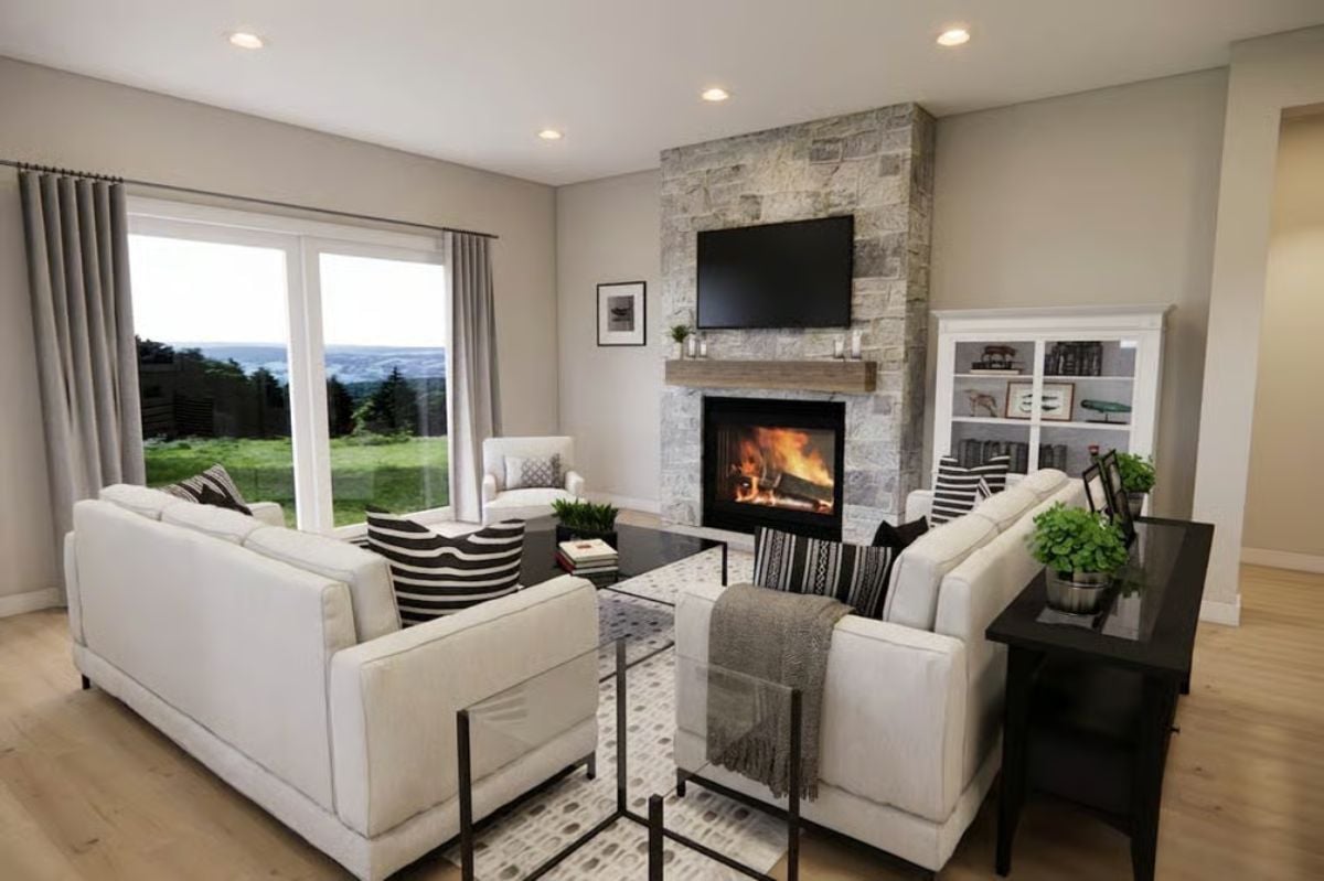 Stone Fireplace Wall Does the Heavy Lifting in This Open Living Room