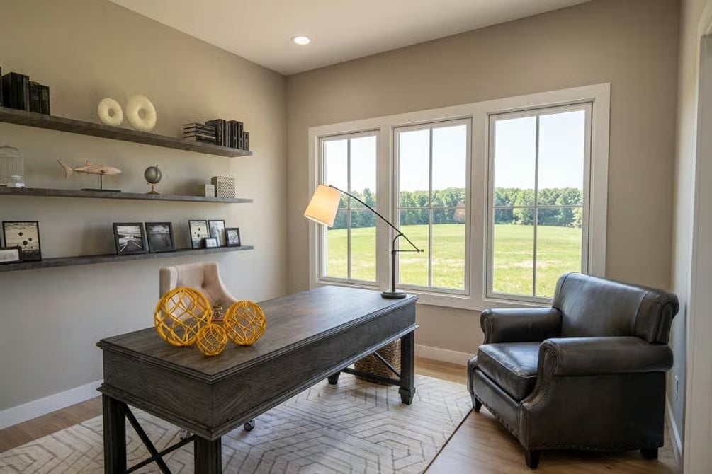 Floating Shelves and a Leather Chair Make This Home Office Work Hard