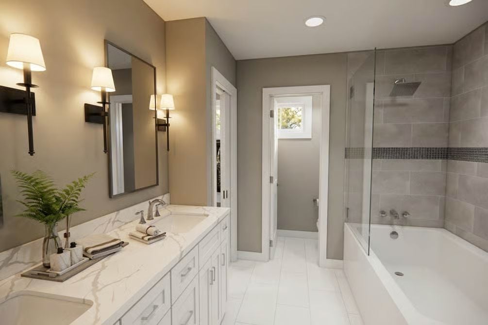 Marble Counters and Sconce Lighting Make This Master Bath Feel Polished