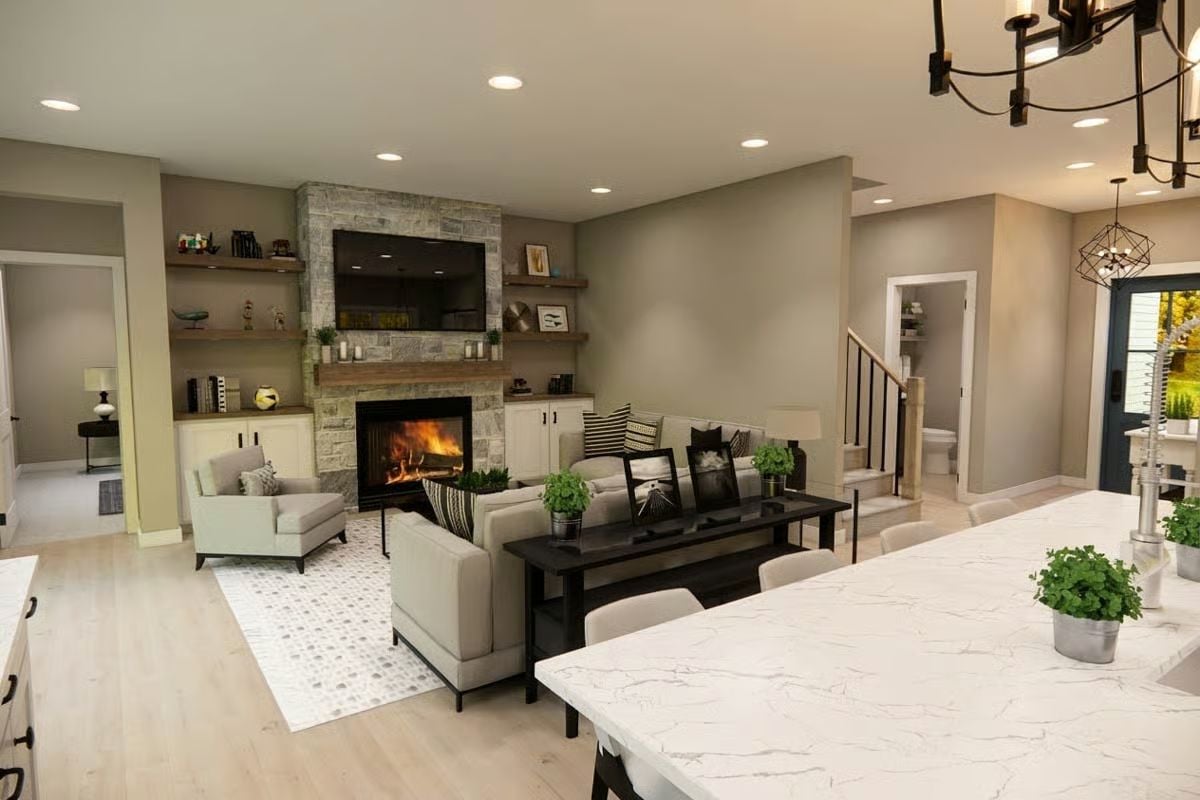 Stone Fireplace Wall Anchors an Open-Concept Living and Kitchen Layout