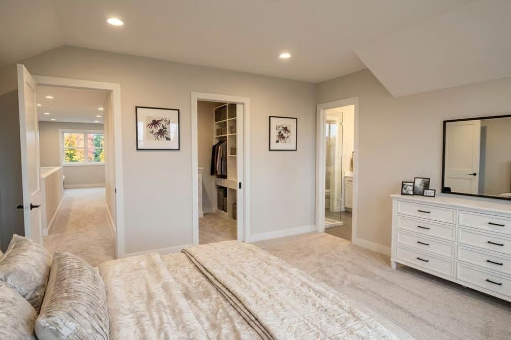Walk-In Closet and En Suite Off the Primary Keep Morning Routines Private