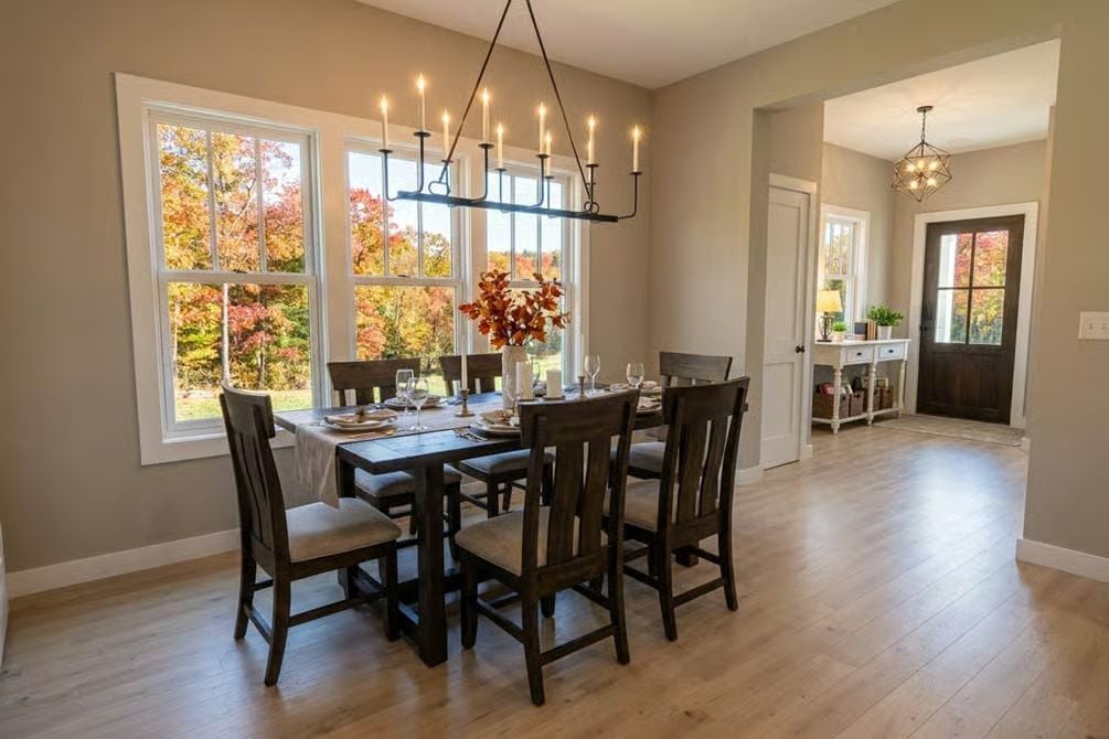 Candlelit Farmhouse Dining With Fall Foliage Framed Behind