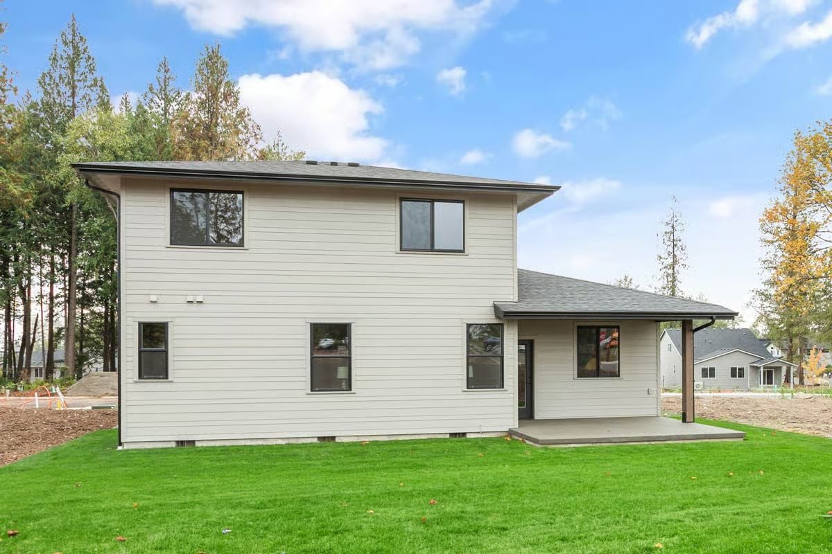Covered Patio Entry and Lap Siding on a Two-Story Northwest Modern Rear Elevation