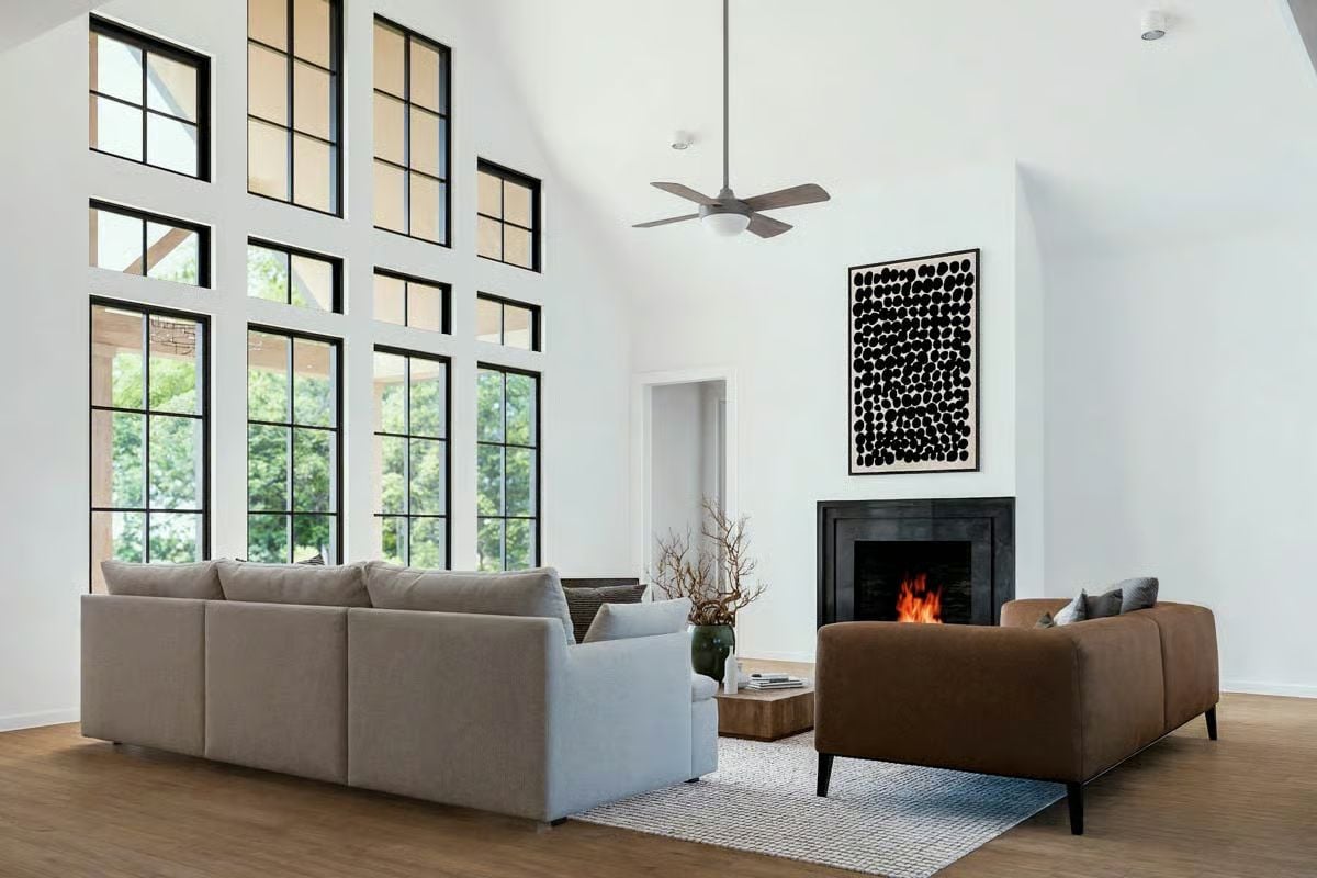 Soaring Ceilings and Black-Frame Windows Define the Great Room