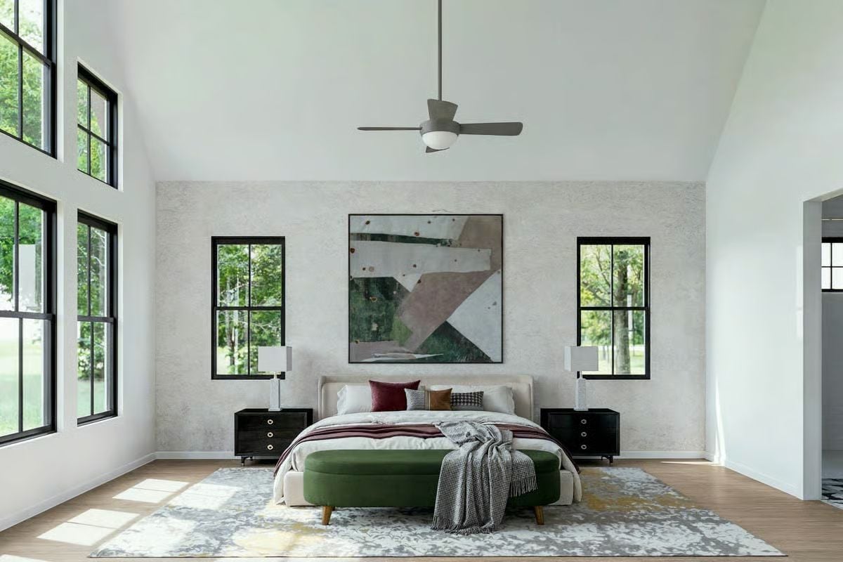 Vaulted Ceilings and a Green Bench Ottoman Make the Master Bedroom