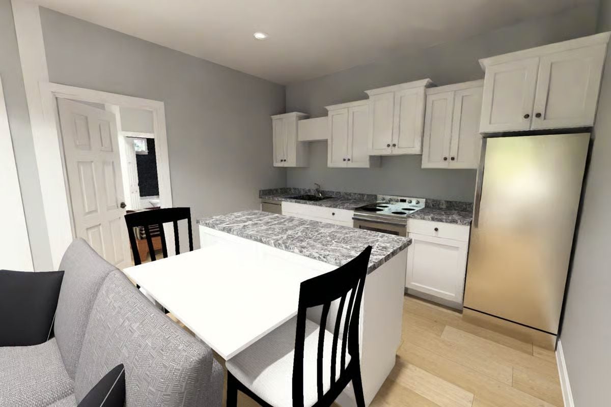 White Cabinets and Granite That Actually Earn Their Place in a Small Kitchen