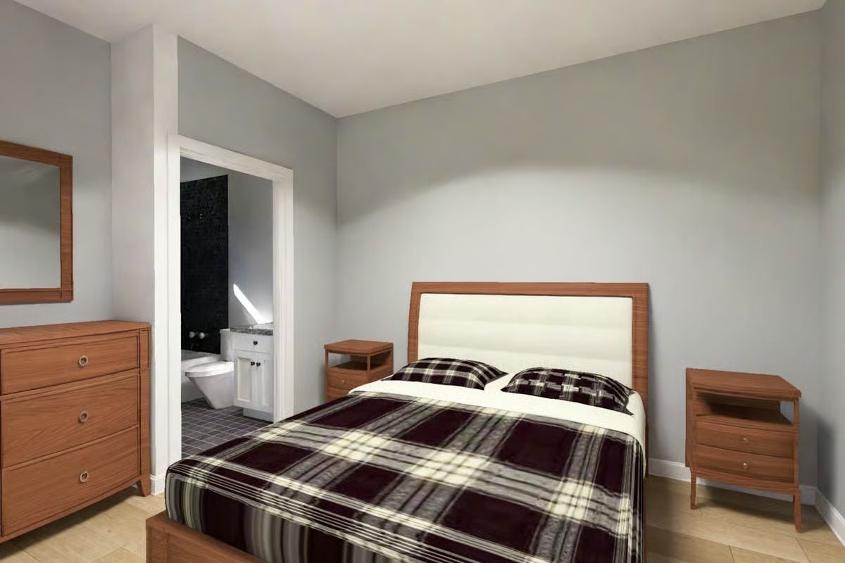 Plaid Bedding and Warm Wood Tones That Make a Bedroom Feel Lived In