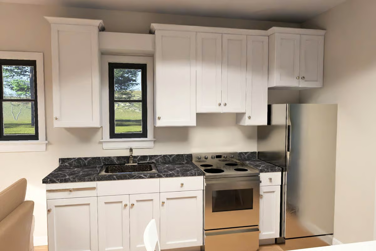 Dark Marble Countertops and Shaker Cabinets Keep This Kitchen Grounded