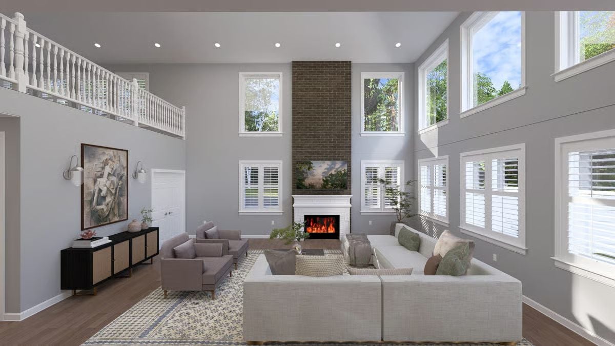 Double-Height Fireplace Wall With Brick Running Straight to the Ceiling