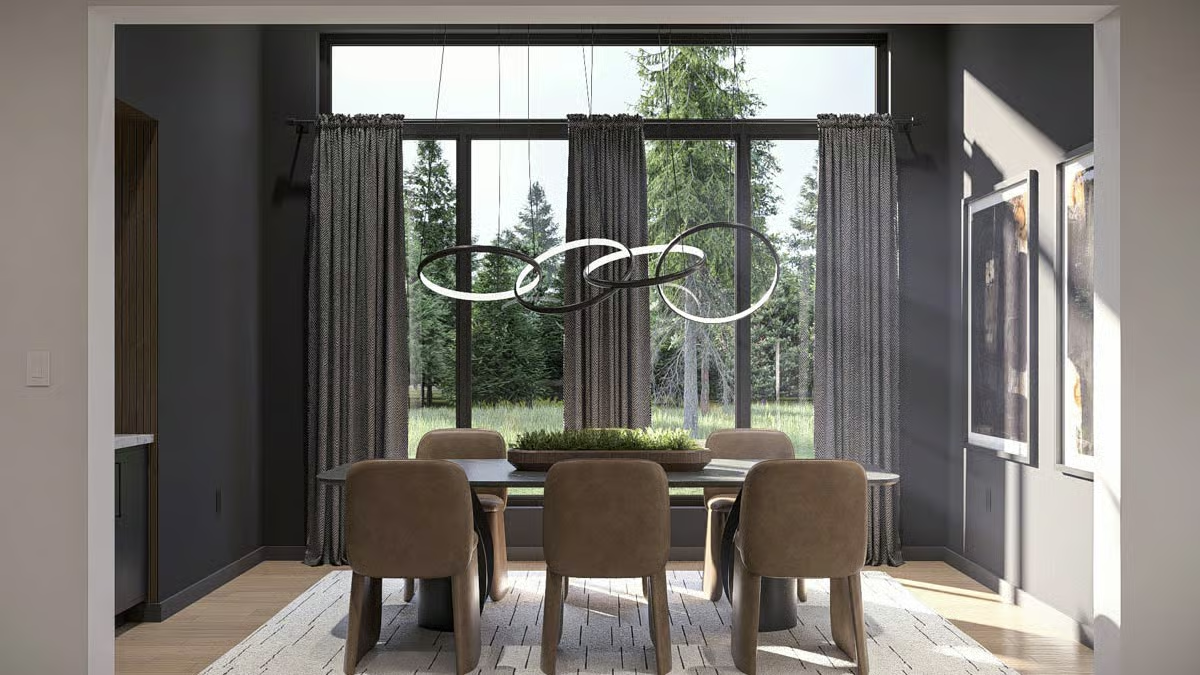 Interlocking Ring Chandelier Over a Dark Dining Table That Commands Attention