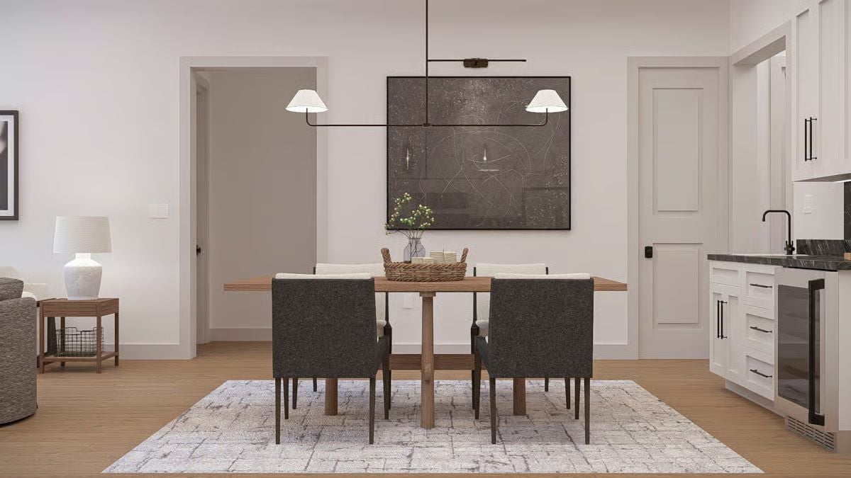 Charcoal Dining Chairs and a Pendant That Pulls the Room Together