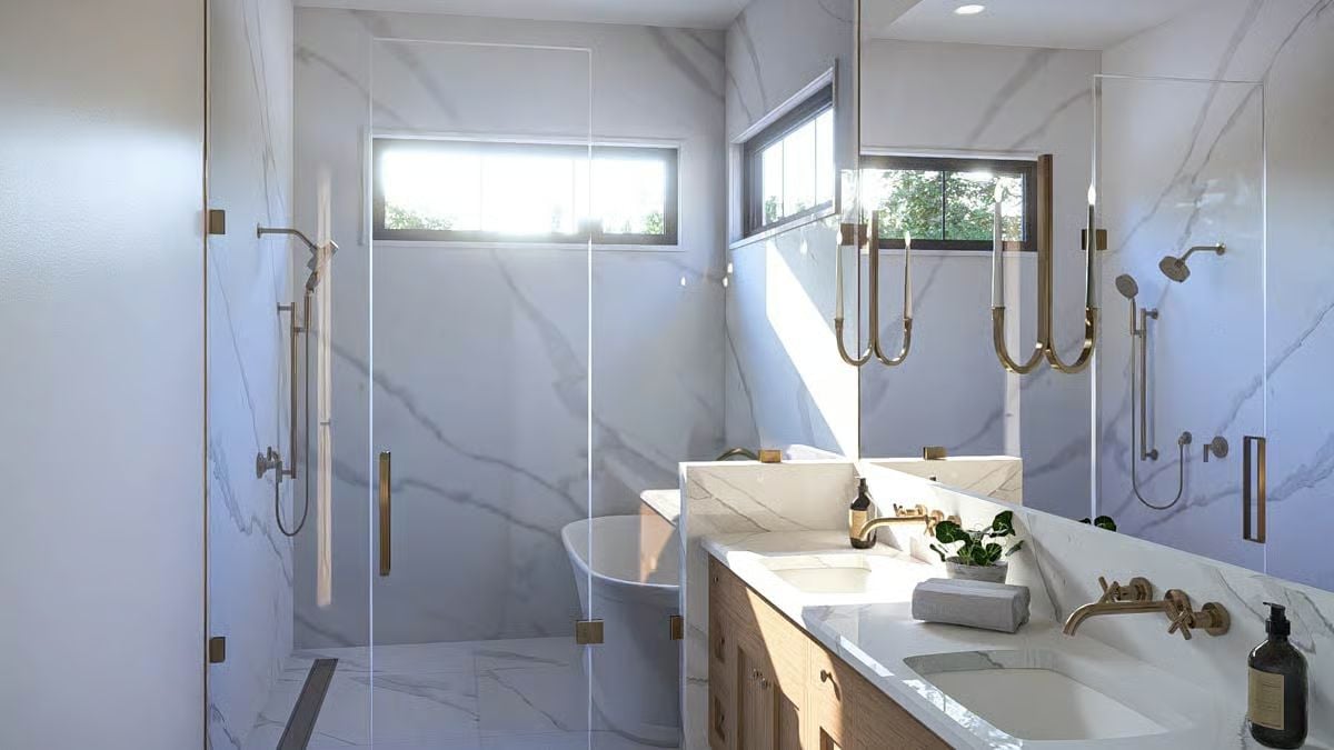 Marble Wet Room Where Wall-Mount Faucets and a Freestanding Tub Share Equal Weight