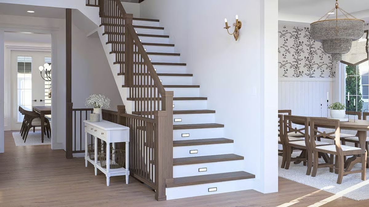 Dark Stair Treads and Painted Risers Pull the Whole Entry Together