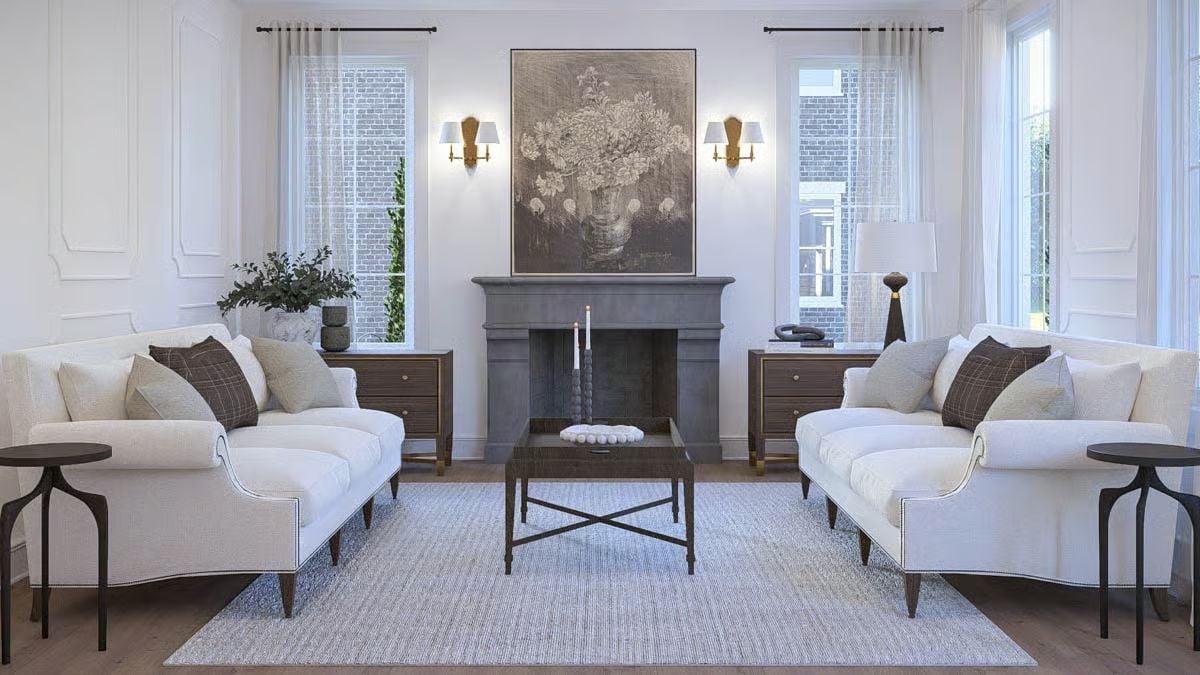 Symmetrical Sofas and a Gray Limestone Fireplace Anchor the Formal Living Room