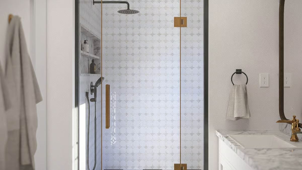 Brushed Gold Hardware and Geometric Tile Make This Shower Worth Lingering In