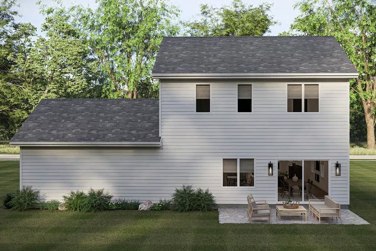 Rear Patio Access Through Sliding Doors Keeps Indoor-Outdoor Flow Natural