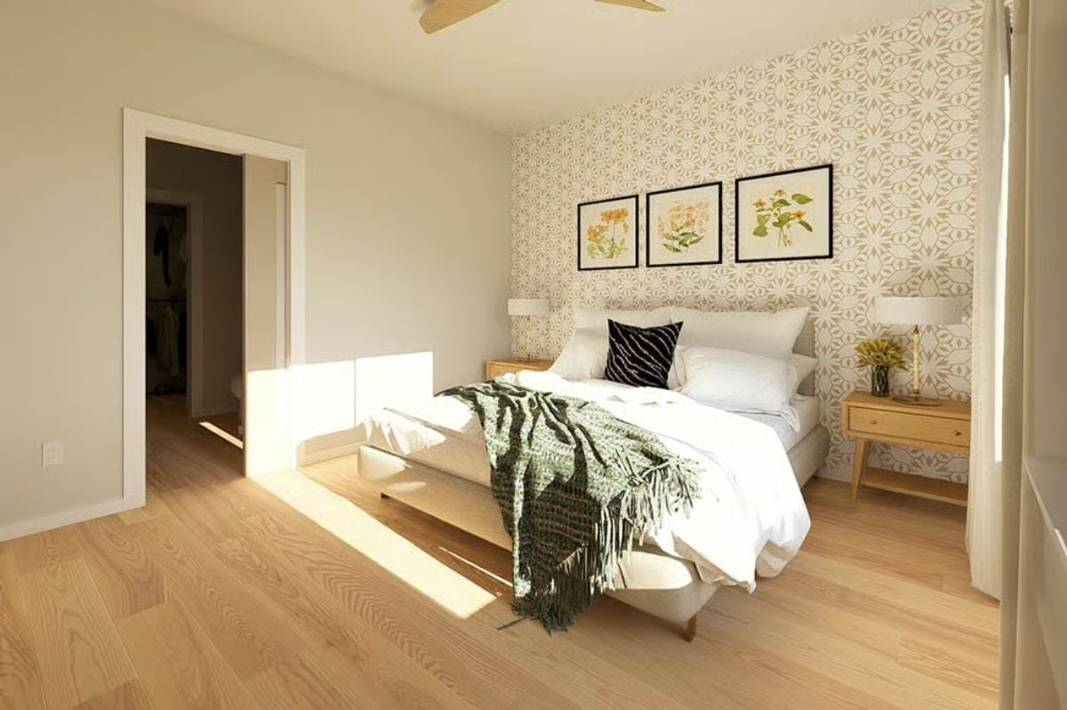 Botanical Prints and a Patterned Accent Wall Do the Heavy Lifting Here