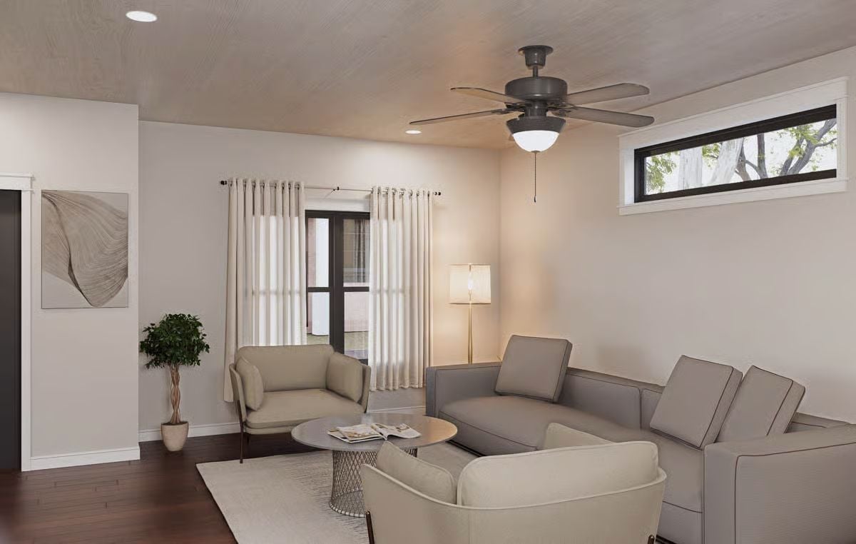 Neutral Tones and a Ceiling Fan Keep This Living Room Grounded