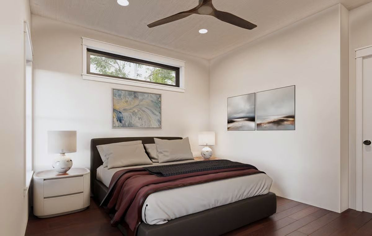 Dark Platform Bed, Clerestory Light, and Art That Holds Its Own
