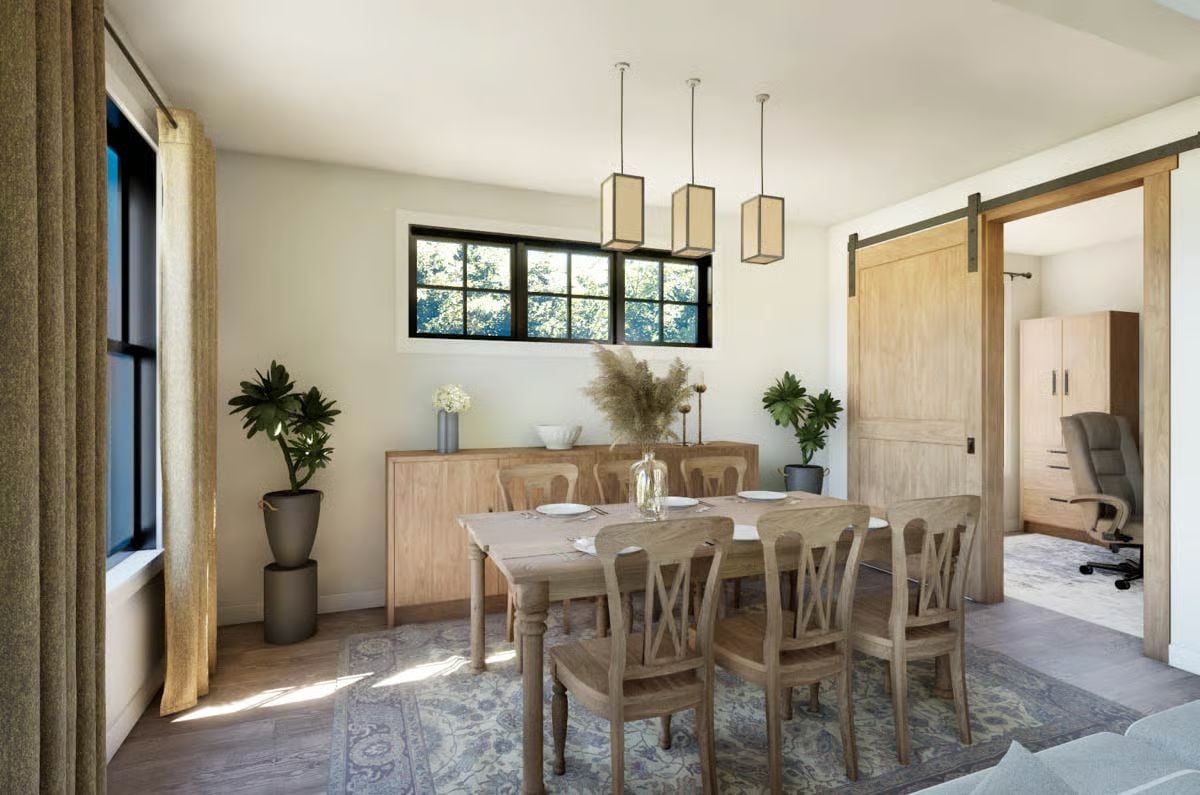 Warm Wood Dining Room Where a Sliding Barn Door Steals the Show