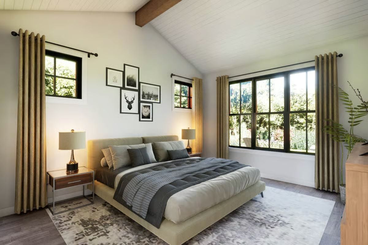 Vaulted Bedroom Where Exposed Beams and Gallery Walls Pull Equal Weight