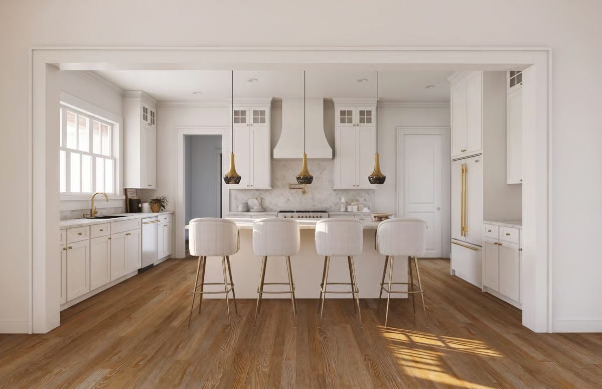Gold Hardware and Warm Wood Floors Ground an All-White Kitchen