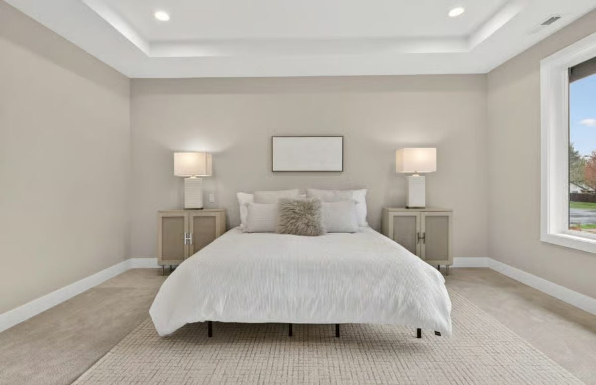 Tray Ceiling and Matching Nightstands Give This Primary Bedroom Its Quiet Authority
