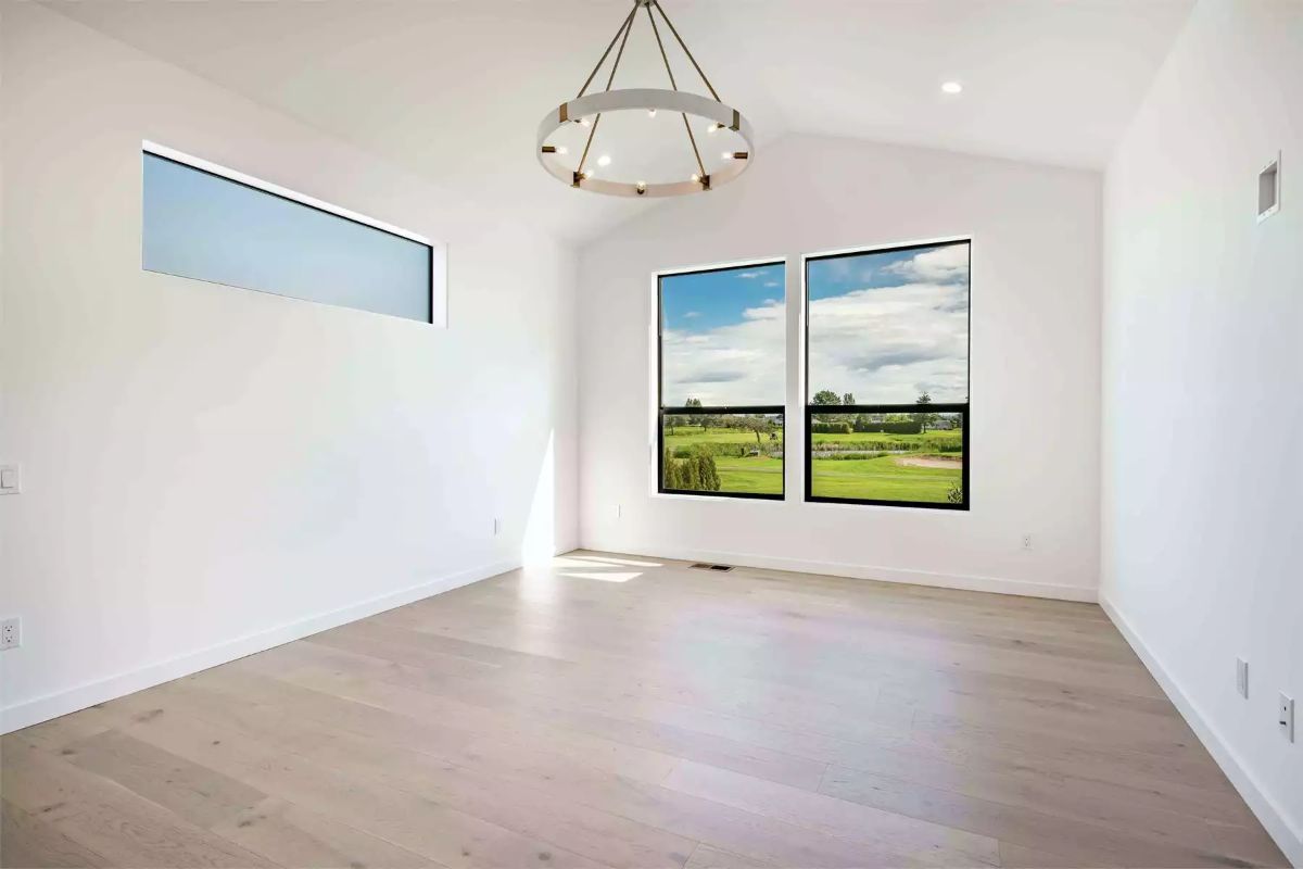 Clerestory Window and Black-Framed Views Over a Golf Course