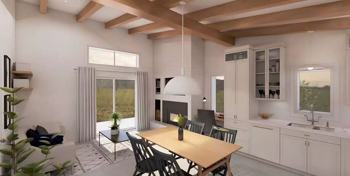 Exposed Beams Meet a Kiva Fireplace in This Open-Concept Gathering Space