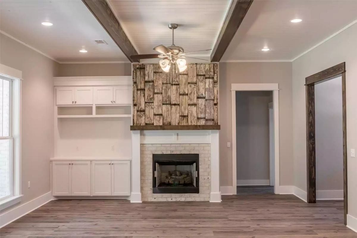 Reclaimed Wood Accent Wall Anchors a Fireplace Built for Gathering