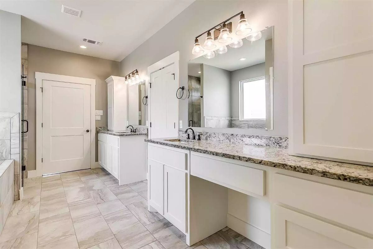 Double Vanities and Granite Countertops Make Sharing a Bathroom Actually Work
