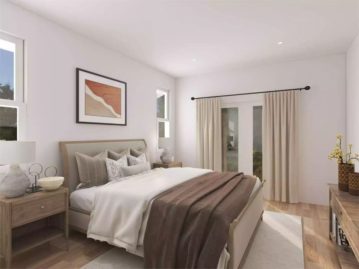 Warm Wood Tones and Layered Linens Make This Bedroom Hard to Leave