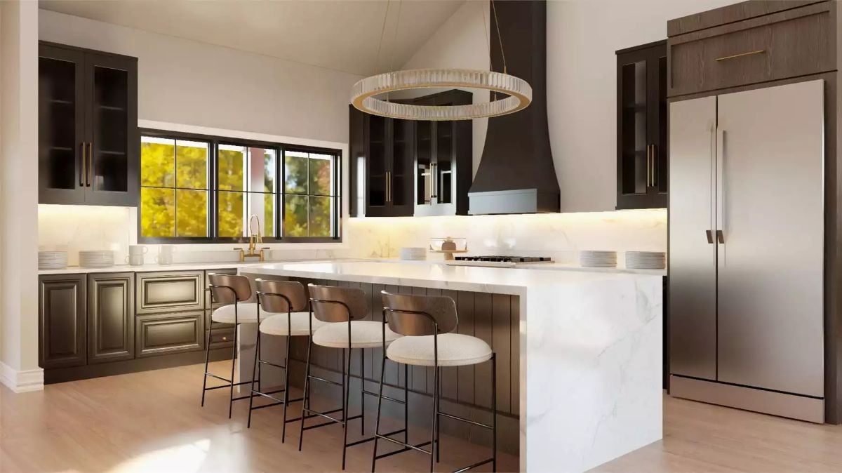 Dark Cabinetry and Marble Waterfall Island Anchor a Kitchen Built to Impress