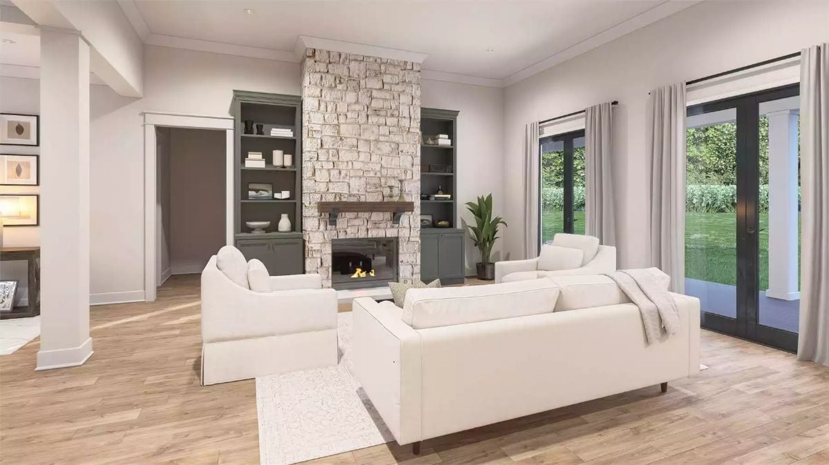 Stone Fireplace Tower and Built-Ins Anchor the Family Room