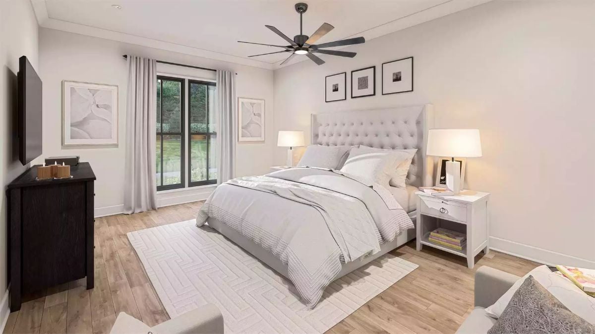 Tufted Headboard and Ceiling Fan Keep This Primary Bedroom Grounded