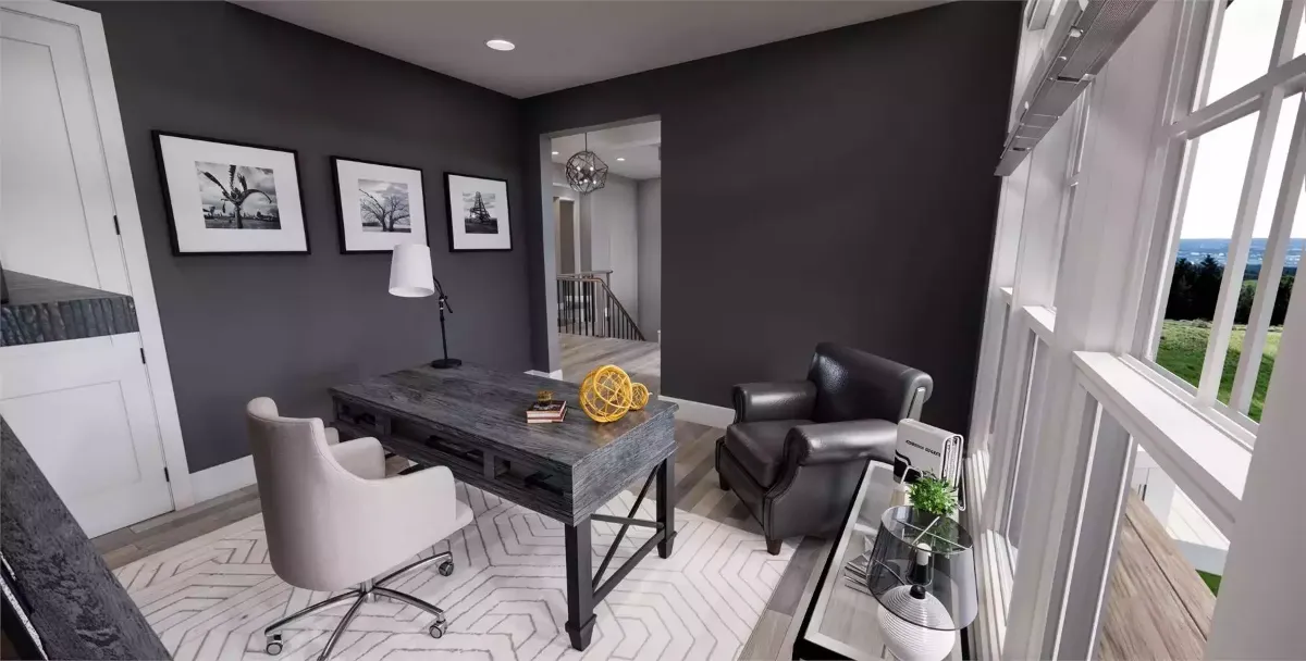 Dark Walls and a Leather Chair Make This Home Office Mean Business